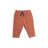 PANTALON EN COTON COLORIS TERRACOTA "Collection WOUF"